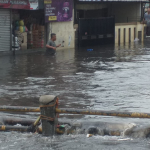 Warga Cimahi Bersihkan Sisa Material Pascabanjir